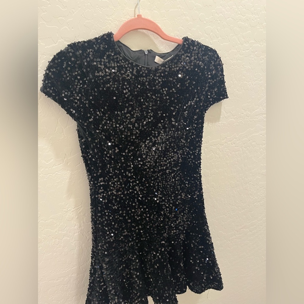 Brand new with tags!! Super feminine hemline. From red dress boutique.